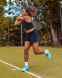Woman wearing Unstoppable Lined Short - Future Navy | Model:Laquisa | Size:S | Thumbnail Index: 1