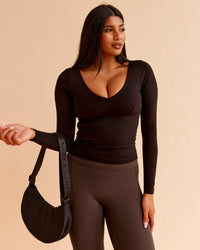 Woman wearing Vitality Long Sleeve Top - Black | Model:Nikki | Size:S | Thumbnail Index: 2