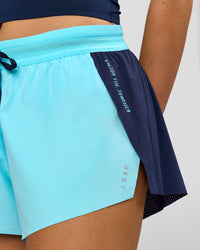 Woman wearing GG Accelerate 3" Mid-Rise Running Short - Future Navy-Baltic Sea | Model:Grace | Size:S | Thumbnail Index: 5