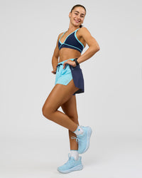 Woman wearing GG Accelerate 3" High-Rise Running Short - Future Navy-Baltic Sea | Model:Grace | Size:S | Thumbnail Index: 2