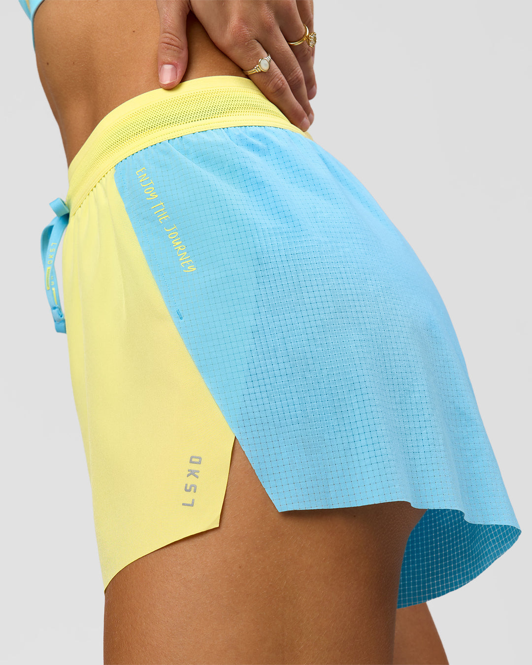 Woman wearing GG Accelerate 3" High-Rise Running Short - Baltic Sea-Lemon | Model:Grace | Size:XS - view 8