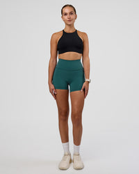 Woman wearing AMRAP High Neck Sports Bra - Black | Model:Myrte | Size:S | Thumbnail Index: 4