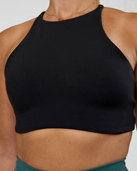 Woman wearing AMRAP High Neck Sports Bra - Black | Model:Myrte | Size:S | Thumbnail Index: 3