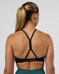 Woman wearing AMRAP High Neck Sports Bra - Black | Model:Myrte | Size:S | Thumbnail Index: 5