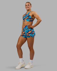 Woman wearing AMRAP High Neck Sports Bra - React Print | Model:Georgia | Size:S | Thumbnail Index: 4