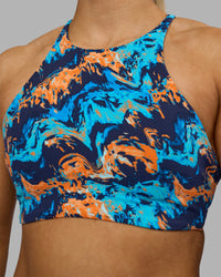 Woman wearing AMRAP High Neck Sports Bra - React Print | Model:Georgia | Size:S | Thumbnail Index: 3