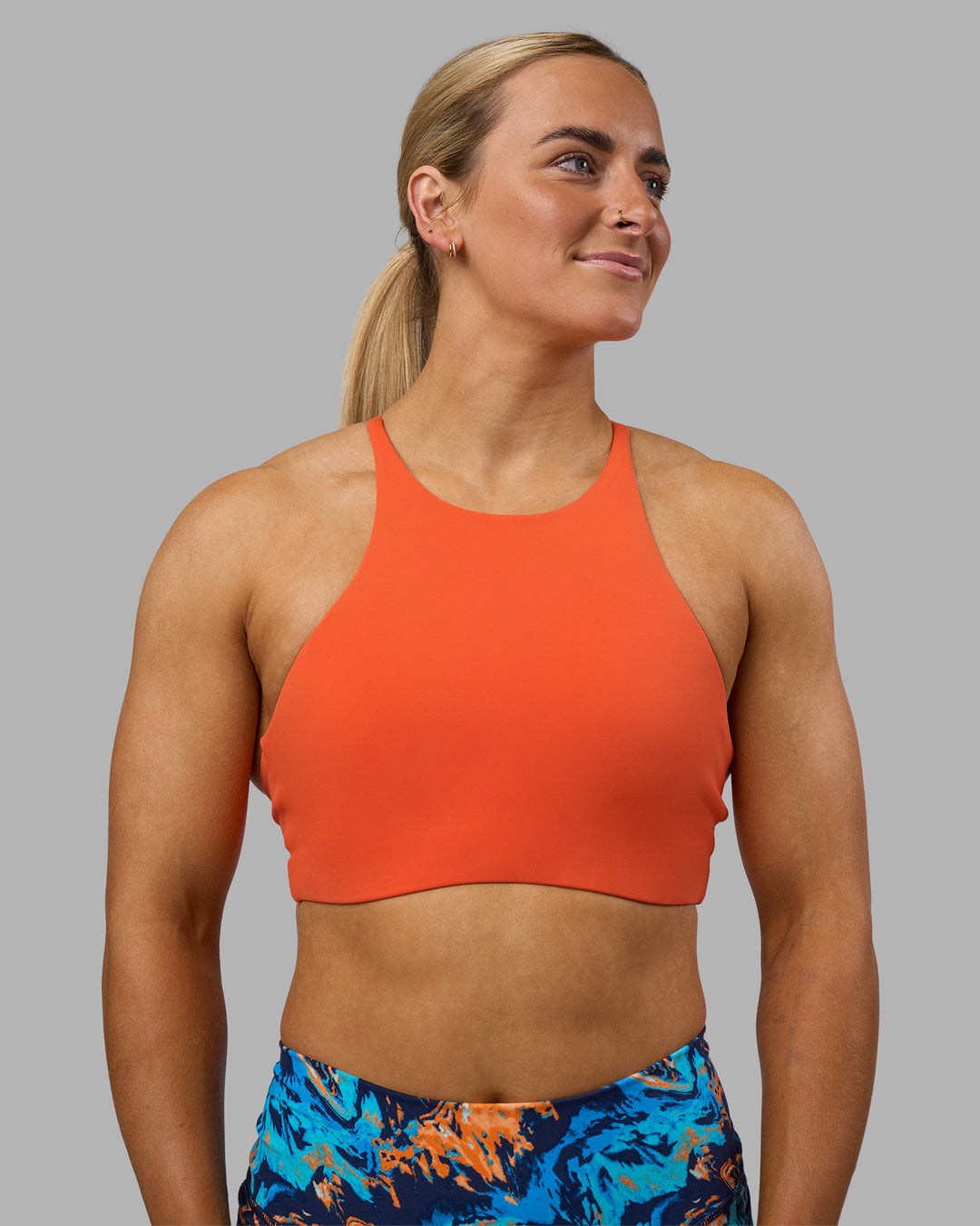 Woman wearing AMRAP High Neck Sports Bra - Ultra Orange | Model:Georgia | Size:S - view 1