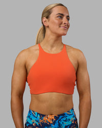 Woman wearing AMRAP High Neck Sports Bra - Ultra Orange | Model:Georgia | Size:S | Thumbnail Index: 0