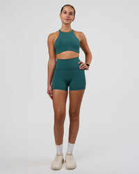 Woman wearing AMRAP High Neck Sports Bra - Transformative Teal | Model:Myrte | Size:S | Thumbnail Index: 4