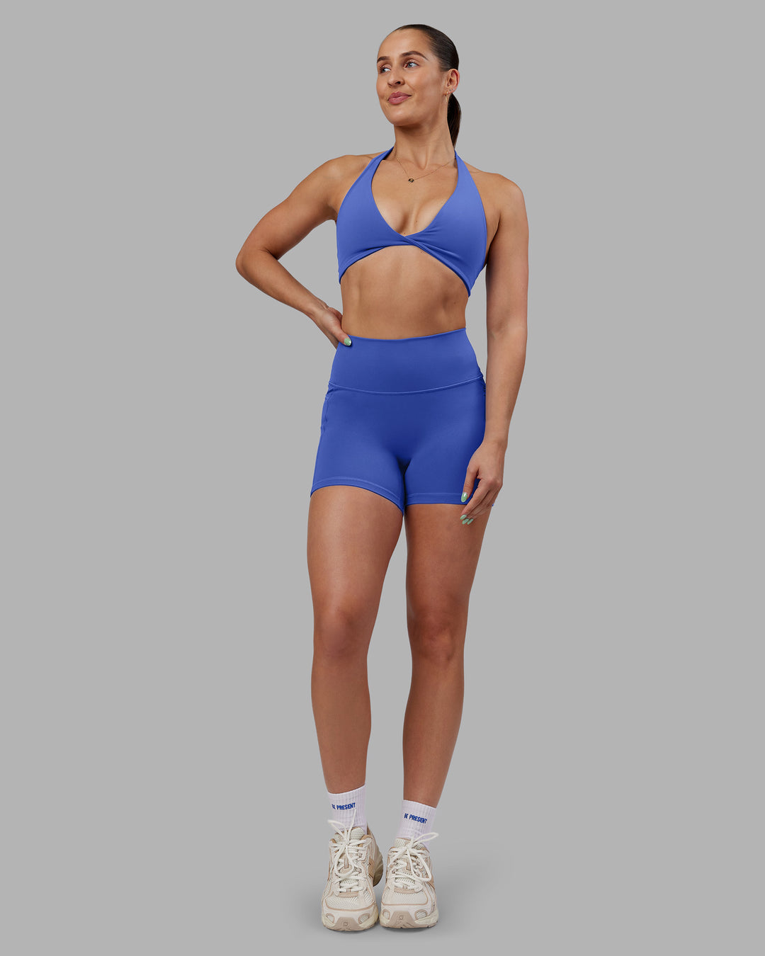 Woman wearing Abs Agile Halter Sports Bra - Power Cobalt | Model:Abbey | Size:S - view 4