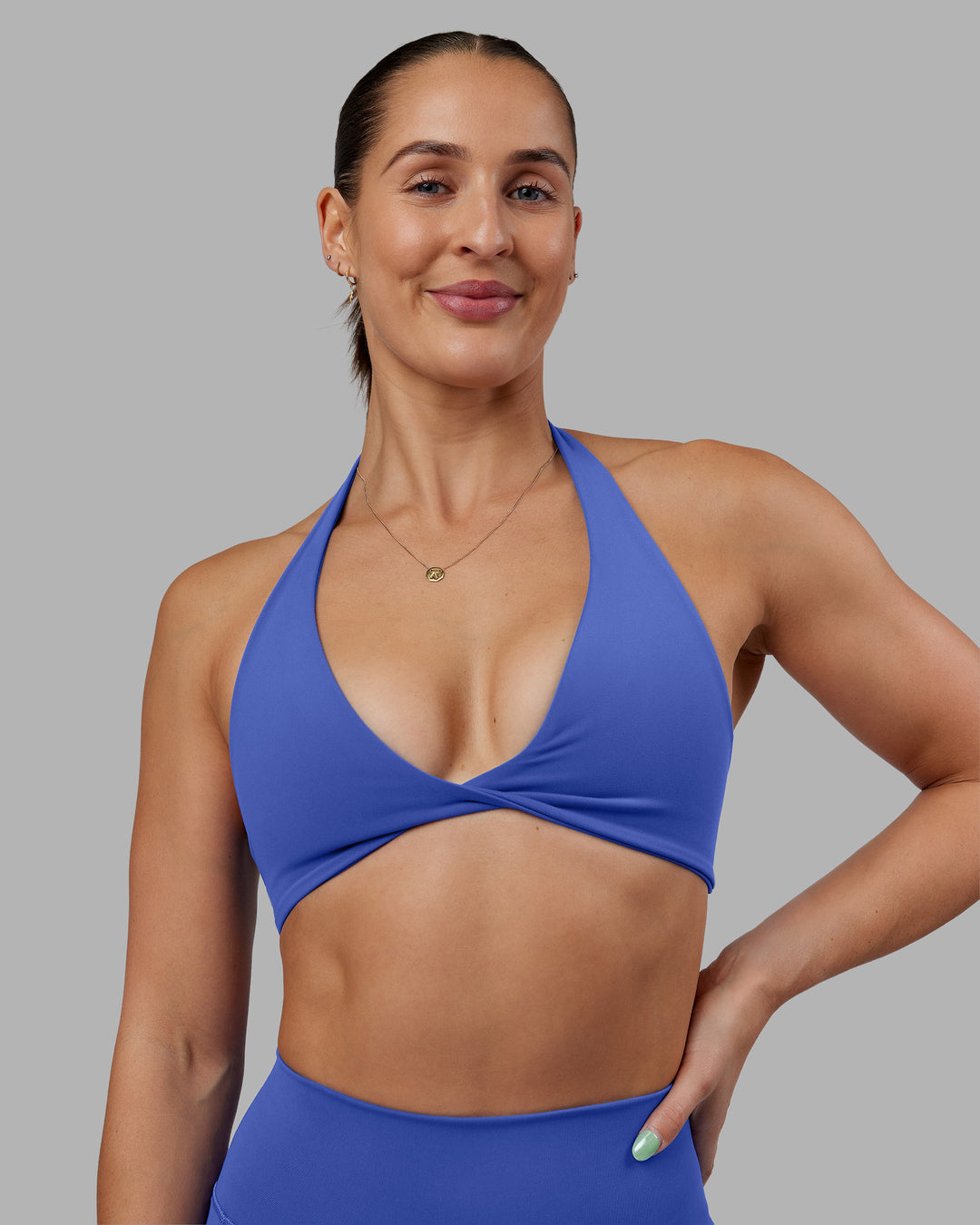 Woman wearing Abs Agile Halter Sports Bra - Power Cobalt | Model:Abbey | Size:S - view 1