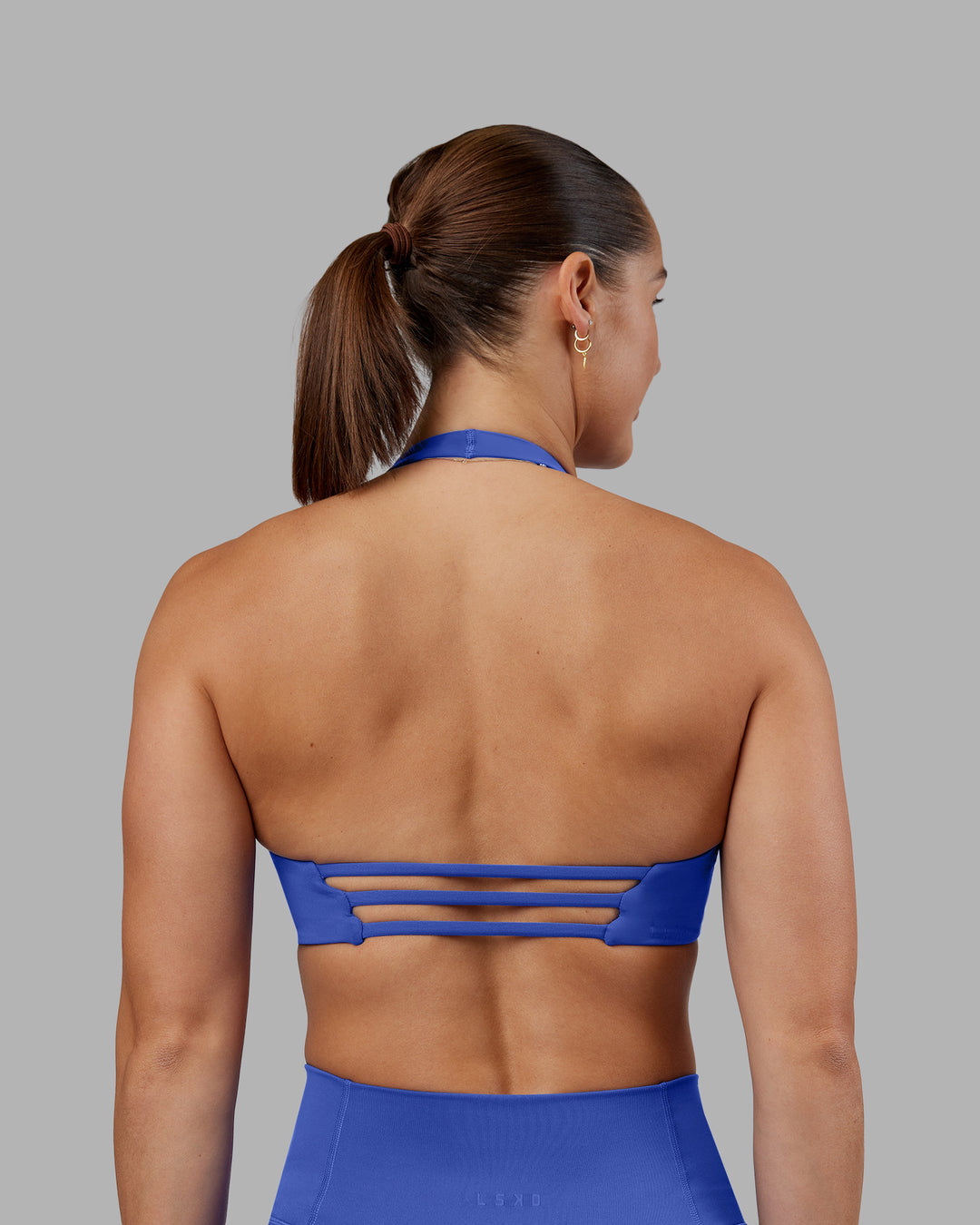 Woman wearing Abs Agile Halter Sports Bra - Power Cobalt | Model:Abbey | Size:S - view 7