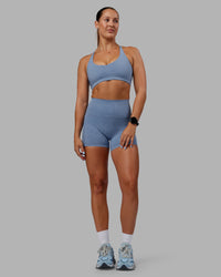 Woman wearing Abs Elixir Ultra High-Rise 4" Short Pockets - Infinity Mirage | Thumbnail Index: 5
