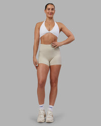 Woman wearing Abs Fusion High-Rise 4" Short Pockets - Shale Beige | Model:Abbey | Size:S | Thumbnail Index: 5