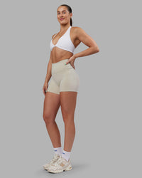 Woman wearing Abs Fusion High-Rise 4" Short Pockets - Shale Beige | Model:Abbey | Size:S | Thumbnail Index: 8