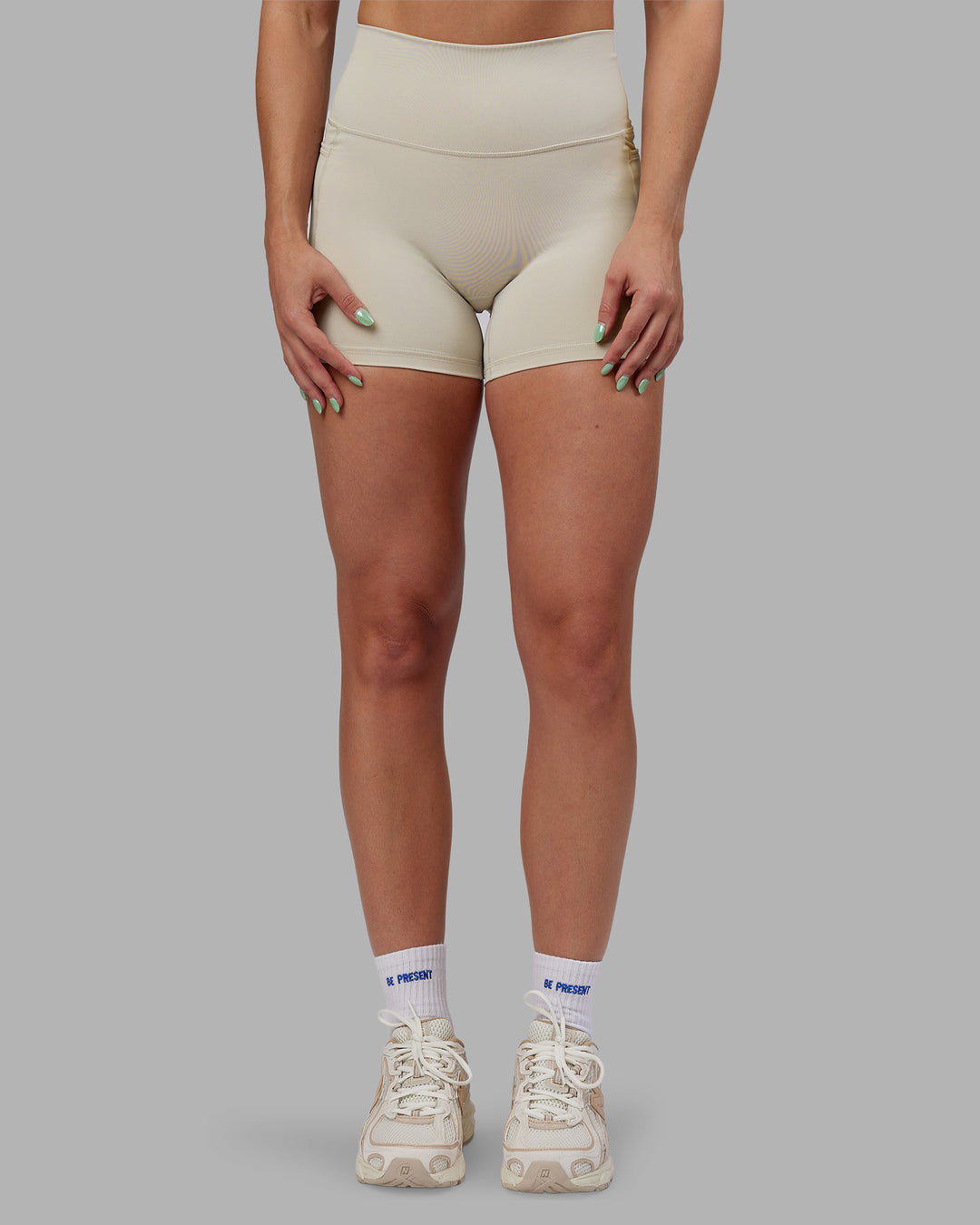 Woman wearing Abs Fusion High-Rise 4" Short Pockets - Shale Beige | Model:Abbey | Size:S - view 8