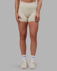 Woman wearing Abs Fusion High-Rise 4" Short Pockets - Shale Beige | Model:Abbey | Size:S | Thumbnail Index: 7