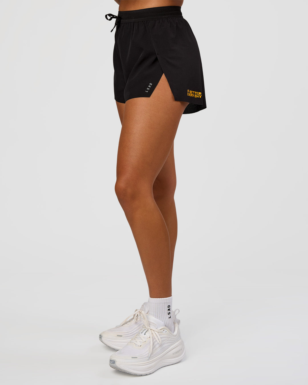 Woman wearing Accelerate 3" High-Rise Running Short - Black-Radiate | Model:Rosie | Size:S - view 9