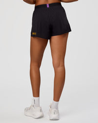 Woman wearing Accelerate 3" High-Rise Running Short - Black-Radiate | Model:Rosie | Size:S | Thumbnail Index: 4