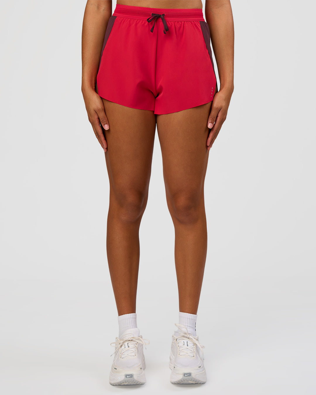 Woman wearing Accelerate 3" High-Rise Running Short - Cherry Lacquer-Scarlet | Model:Rosie | Size:S | - view 4