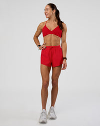 Woman wearing Accelerate 3" High-Rise Running Short - Flame | Model:Zara | Size:S | Thumbnail Index: 4