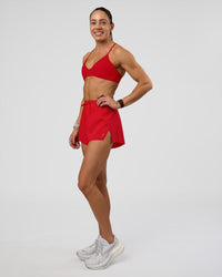 Woman wearing Accelerate 3" High-Rise Running Short - Flame | Model:Zara | Size:S | Thumbnail Index: 1