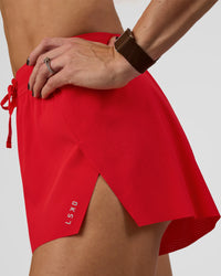 Woman wearing Accelerate 3" High-Rise Running Short - Flame | Model:Zara | Size:S | Thumbnail Index: 2
