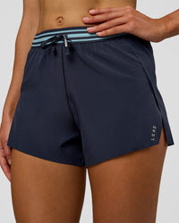 Woman wearing Accelerate 3" High-Rise Running Short - Future Navy-Baltic Sea | Set:true | Angle:closeup | Model:Evie | Size:S | Thumbnail Index: 0