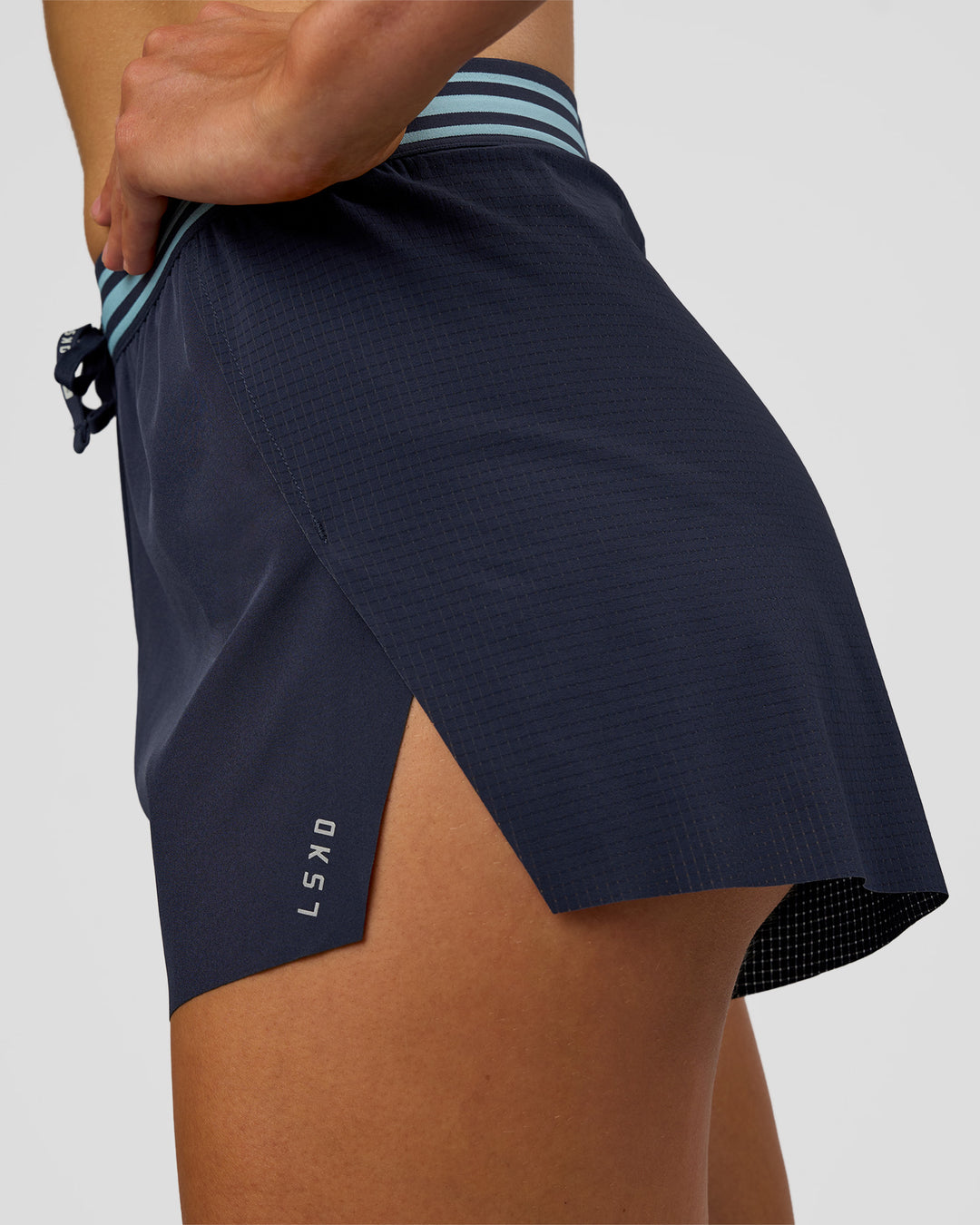 Woman wearing Accelerate 3" High-Rise Running Short - Future Navy-Baltic Sea | Model:Evie | Size:S - view 6