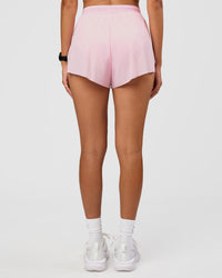 Woman wearing Accelerate 3" High-Rise Running Short - Marshmallow | Set:true | Angle:back | Model:Rhiley | Size:S | Thumbnail Index: 3