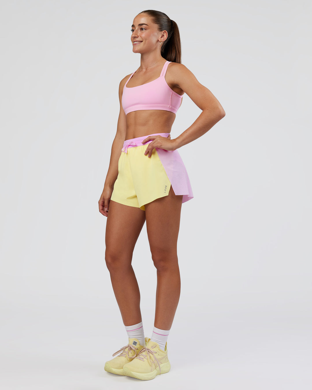 Woman wearing Accelerate 3" High-Rise Running Short - Marshmallow-Lemon | Model:Grace | Size:S - view 5