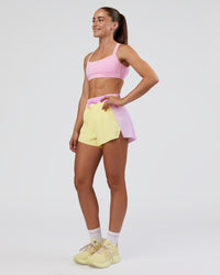 Woman wearing Accelerate 3" High-Rise Running Short - Marshmallow-Lemon | Model:Grace | Size:S | Thumbnail Index: 4