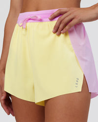 Woman wearing Accelerate 3" High-Rise Running Short - Marshmallow-Lemon | Set:true | Angle:closeup | Model:Grace | Size:S | Thumbnail Index: 2