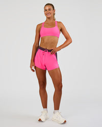 Woman wearing Accelerate 3" High-Rise Running Short - Midnight Plum-Sugar Plum | Model:Emelia | Size:S | Thumbnail Index: 7