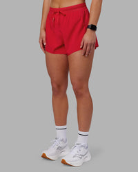 Woman wearing Accelerate 3" High-Rise Running Short - Scarlet | Set:true | Angle:side | Model:Keisha | Size:S | Thumbnail Index: 9
