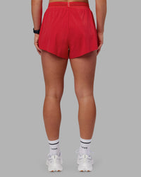 Woman wearing Accelerate 3" High-Rise Running Short - Scarlet | Set:true | Angle:back | Model:Keisha | Size:S | Thumbnail Index: 7