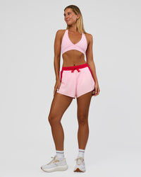 Woman wearing Accelerate 3" High-Rise Running Short - Scarlet-Marshmallow | Model:Amity | Size:S | Thumbnail Index: 1