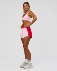 Woman wearing Accelerate 3" High-Rise Running Short - Scarlet-Marshmallow | Model:Amity | Size:S | Thumbnail Index: 5