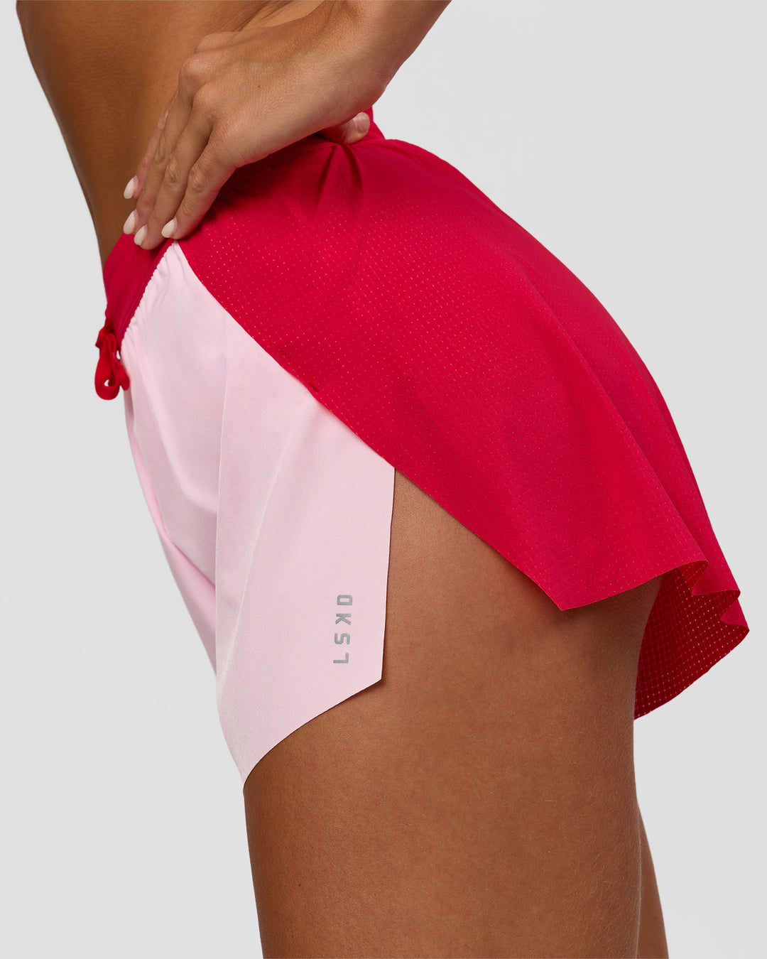 Woman wearing Accelerate 3" High-Rise Running Short - Scarlet-Marshmallow | Model:Amity | Size:S - view 4