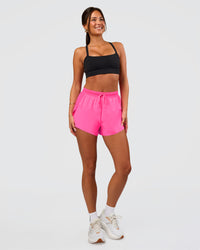 Woman wearing Accelerate 3" High-Rise Running Short - Sugar Plum | Set:true | Angle:side | Model:Bianca | Size:S | Thumbnail Index: 3