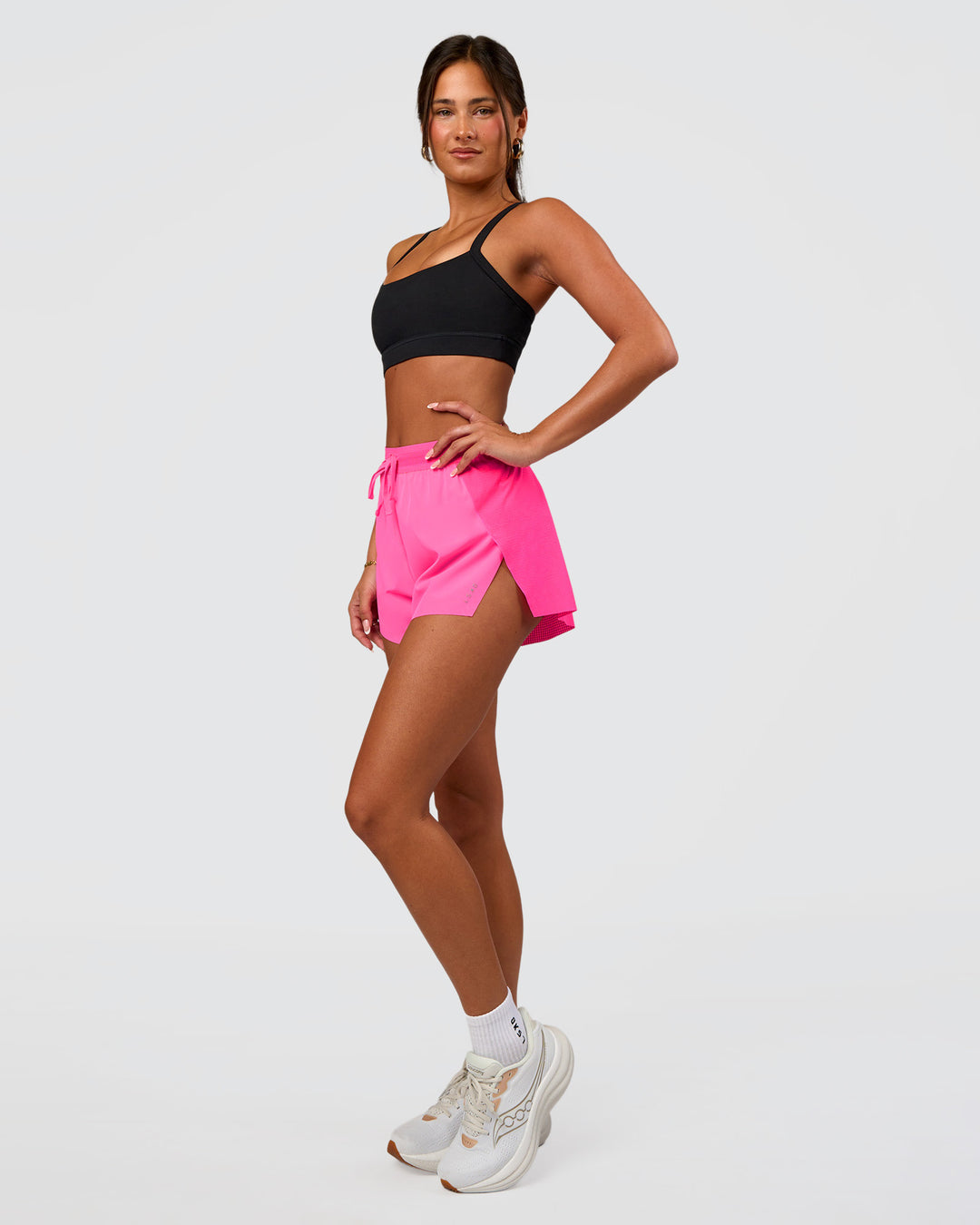 Woman wearing Accelerate 3" High-Rise Running Short - Sugar Plum | Set:true | Angle:side | Model:Bianca | Size:S - view 5