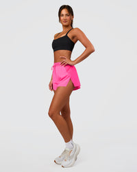 Woman wearing Accelerate 3" High-Rise Running Short - Sugar Plum | Set:true | Angle:side | Model:Bianca | Size:S | Thumbnail Index: 4