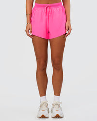 Woman wearing Accelerate 3" High-Rise Running Short - Sugar Plum | Set:true | Angle:side | Model:Bianca | Size:S | Thumbnail Index: 0