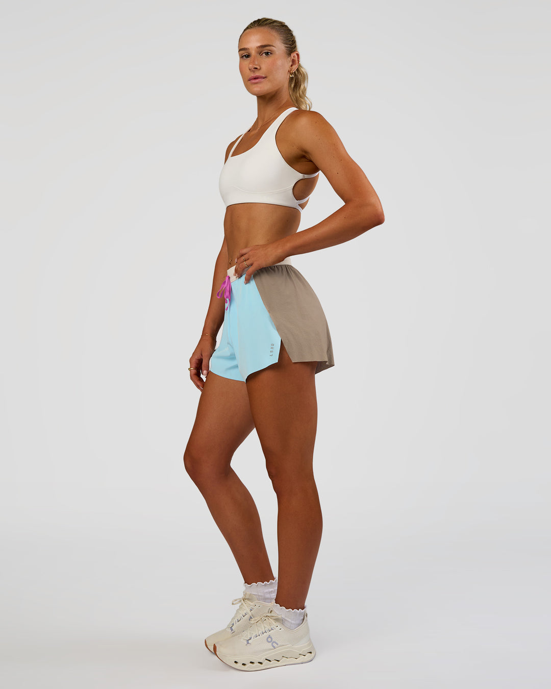 Woman wearing Accelerate 3" High-Rise Running Short - Taupe Ash-Glacial Blue | Model:Emelia | Size:S - view 7