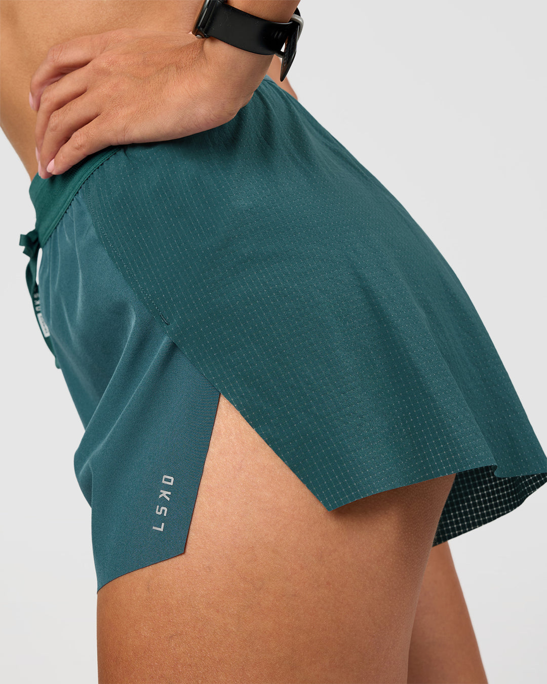 Woman wearing Accelerate 3" High-Rise Running Short - Transformative Teal | Model: Rhiley | Size:S - view 6