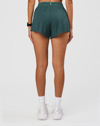 Woman wearing Accelerate 3" High-Rise Running Short - Transformative Teal | Set:true | Angle:back | Model: Rhiley | Size:S | Thumbnail Index: 3