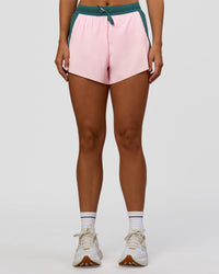 Woman wearing Accelerate 3" High-Rise Running Short - Transformative Teal-Marshmallow | Set:true | Angle:front | Model:Amity | Size:S | Thumbnail Index: 0