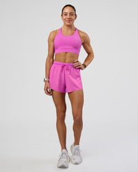 Woman wearing Accelerate 3" High-Rise Running Short - Ultra Fuchsia | Model:Zara | Size:S | Thumbnail Index: 7