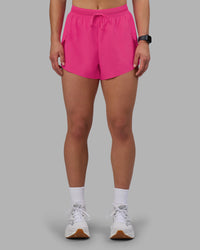 Woman wearing Accelerate 3" High-Rise Running Short - Ultra Pink | Set:true | Angle:front | Model:Keisha | Size:S | Thumbnail Index: 1