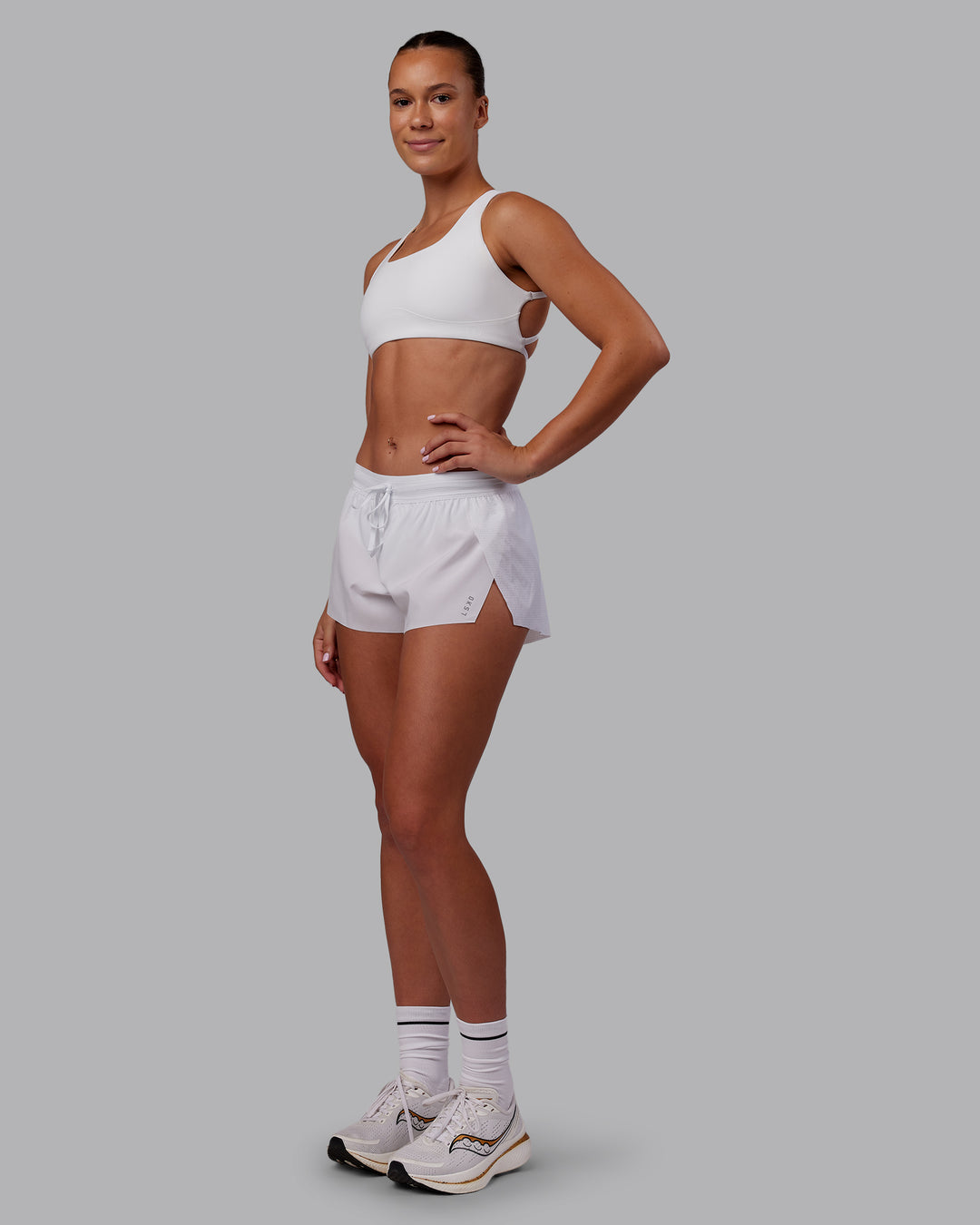 Woman wearing Accelerate 3" Running Short - White | Model:Charlize | Size:S - view 6